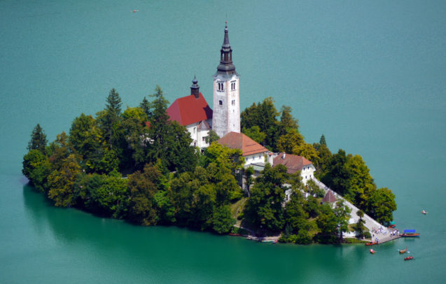 Bled Island in the middle of Lake Bled with an idyllic church built on it.