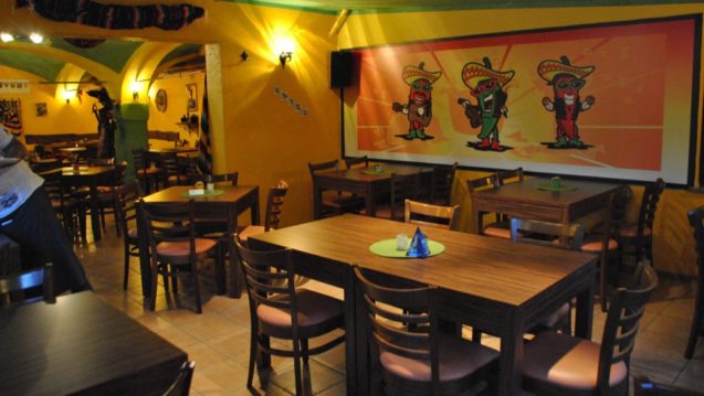 Dining tables at Mexican restaurant called Krcma Mexico