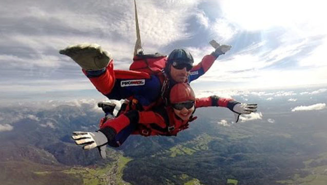 Tandem parachuting near Bled in Slovenian Alps