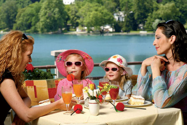 A family on the terrace at Restaurant Cafe Park in Bled