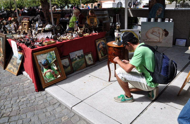 Sunday Flea Market in Ljubljana, along the riverside on and around Cobbler's Bridge