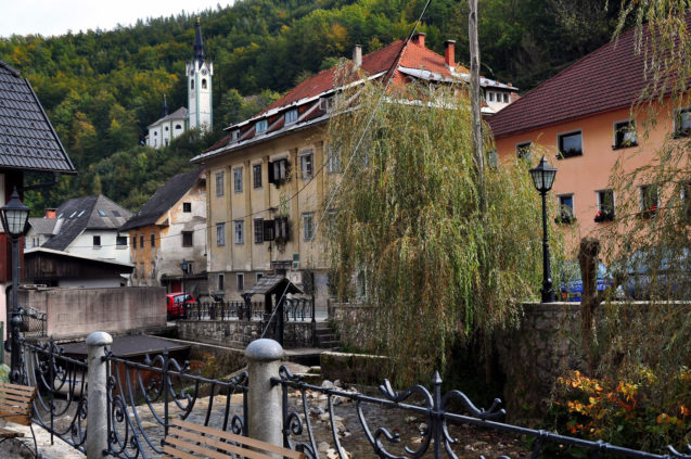 The centre of Kropa, the central building is the Klinar's house which houses the iron forging museum