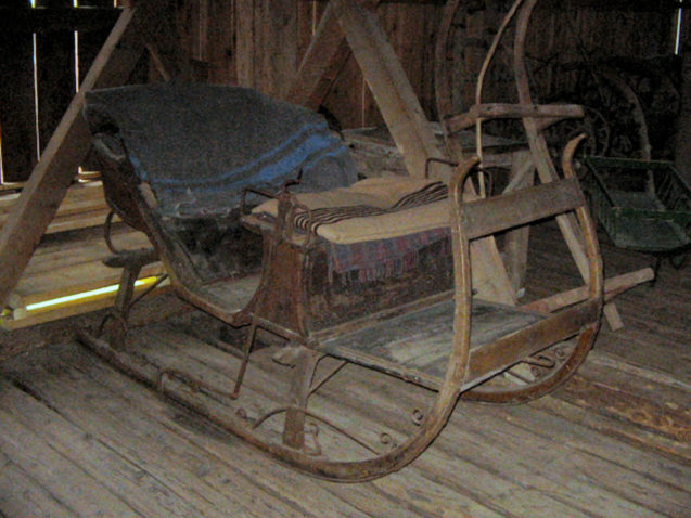 Sleds inside Liznjek House in Kranjska Gora