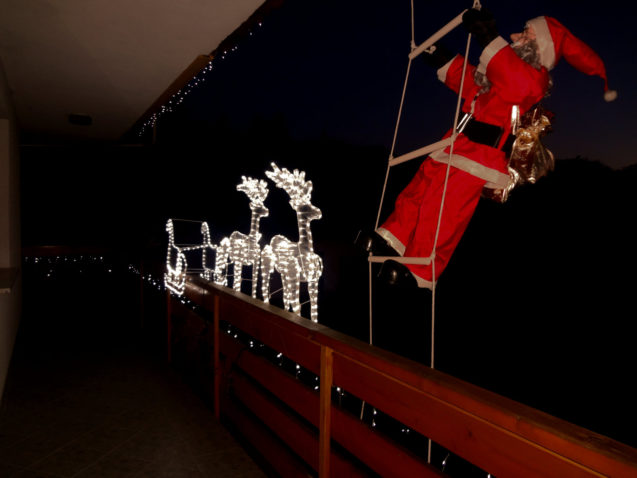 Exterior of the Fine Stay Apartment during the festive season with Santa and reindeers