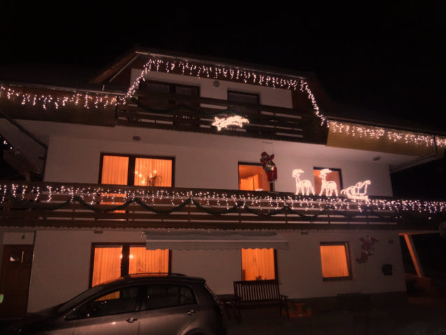 Exterior of the Fine Stay Apartment during the festive season decorated with Christmas lights