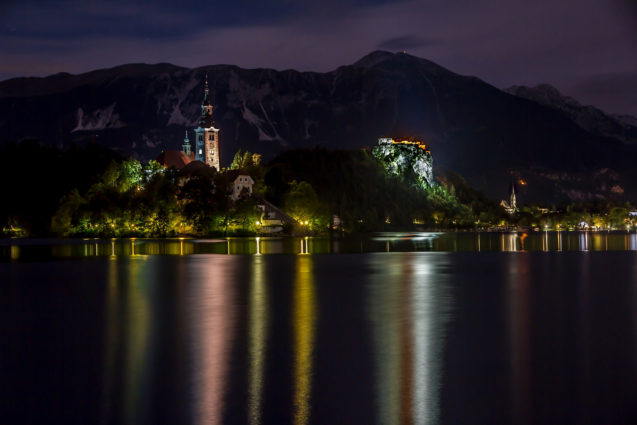 Lake Bled and its island and castle at night