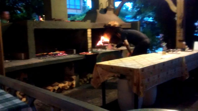 Open fire at the Grill Restaurant and Terrace Lovec in Lake Bled, Slovenia