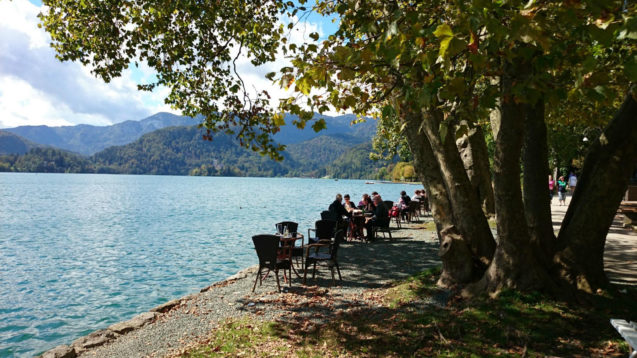 Outdoor lakeside tables of the Vila Preseren Restaurant and Cafe in Lake Bled, Slovenia
