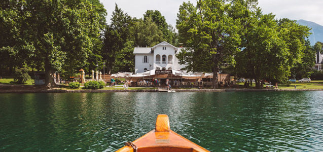 View of the Vila Preseren Restaurant and Cafe from Lake Bled in Slovenia