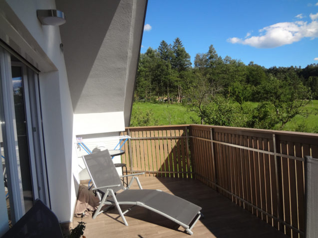 A sunbath chair on the balcony of the Fine Stay Apartment in the Bled Area Of Slovenia