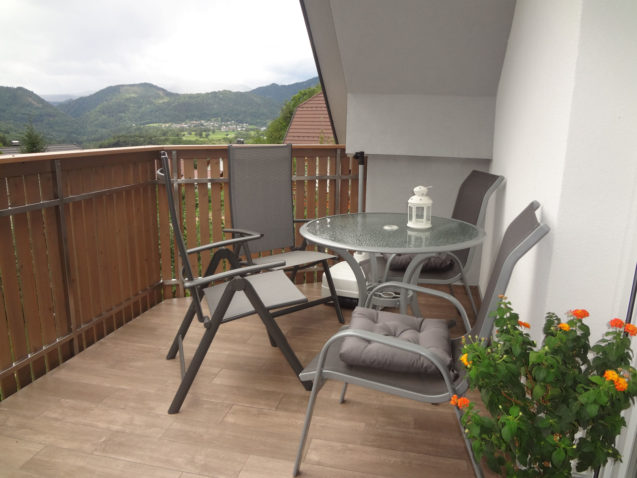 A balcony with garden furniture at the Fine Stay Apartment in the Bled Area Of Slovenia