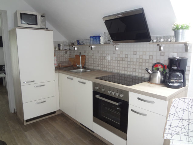 A well-equipped kitchen in the Fine Stay Apartment in the Bled Area Of Slovenia
