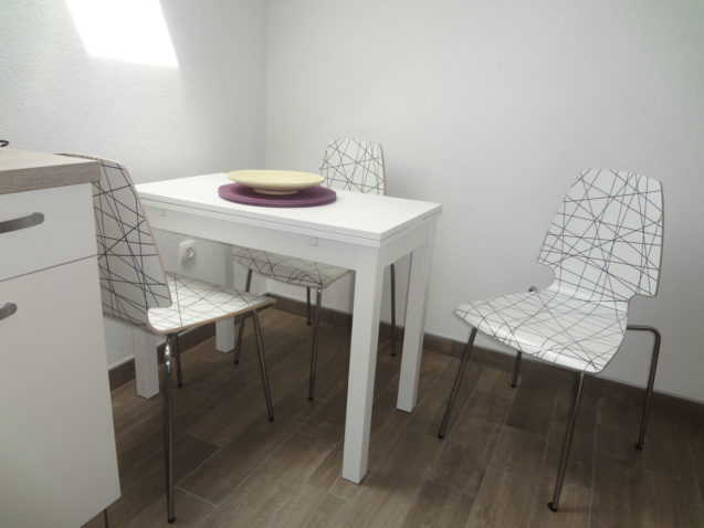 A dinning table in the Fine Stay Apartment in the Bled Area Of Slovenia