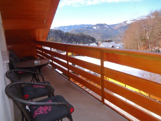 A wintry view of the Slovenian Alps from the balcony of Apartments Fine Stay in Slovenia