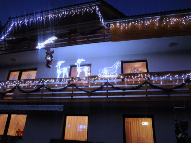 A house decorated with Christmas lights