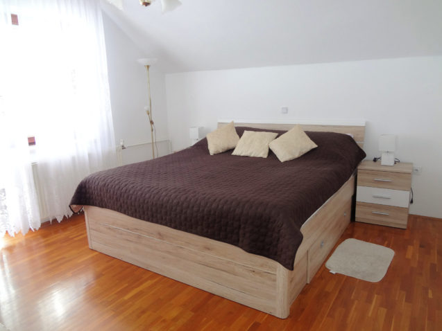 A king-size double bed in the first bedroom of Superior Apartment With 3 Balconies, Apartments Fine Stay