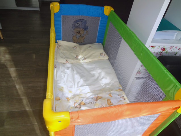 A baby bed in the apartment at Apartments Fine Stay in the Lake Bled area of Slovenia