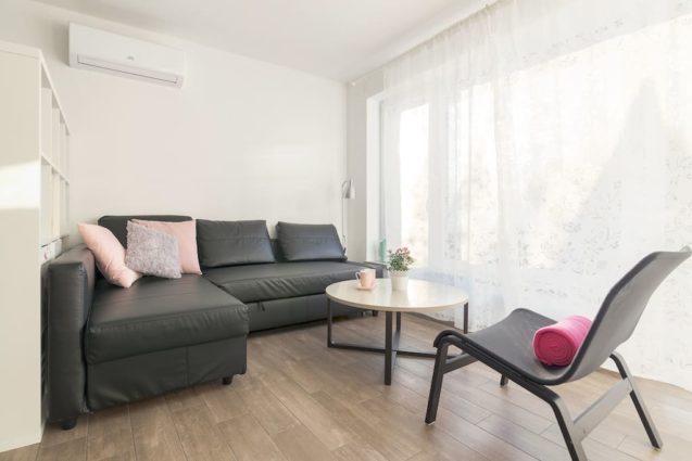 Living area with a sofa in the Modern Apartment With Balcony and Terrace, Apartments Fine Stay