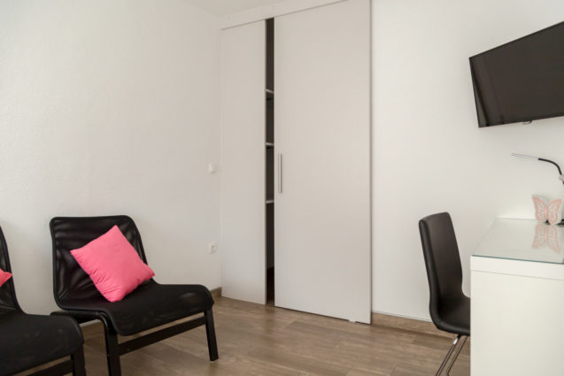 Fitted closet in the second bedroom of the Modern Apartment With Balcony and Terrace