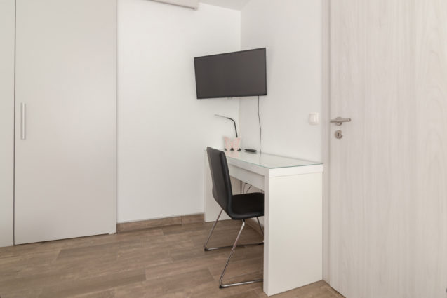 Working desk in the second bedroom of the Modern Apartment With Balcony and Terrace