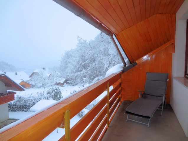 A view from the second balcony of the Superior Apartment with 3 Balconies towards the Slovenian Alps on a snowy winter day