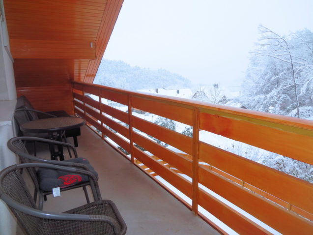 A view from the third balcony of the Superior Apartment with 3 Balconies towards the Slovenian Alps on a snowy winter day