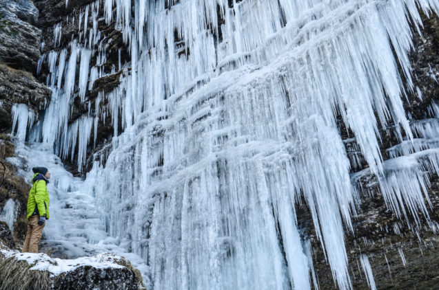 Frozen Pericnik waterfall in Slovenia and beautiful formation of icicles