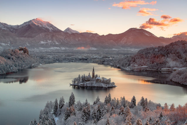 A beautiful view of Lake Bled in the winter at sunrise