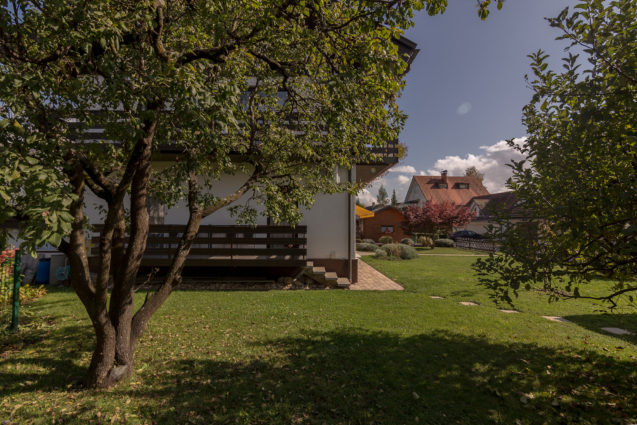 Fruit trees and a garden in front of Apartments Fine Stay Bled in the autumn