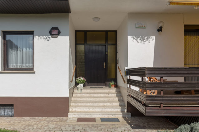 The front doors of Apartments Fine Stay Bled in Lake Bled