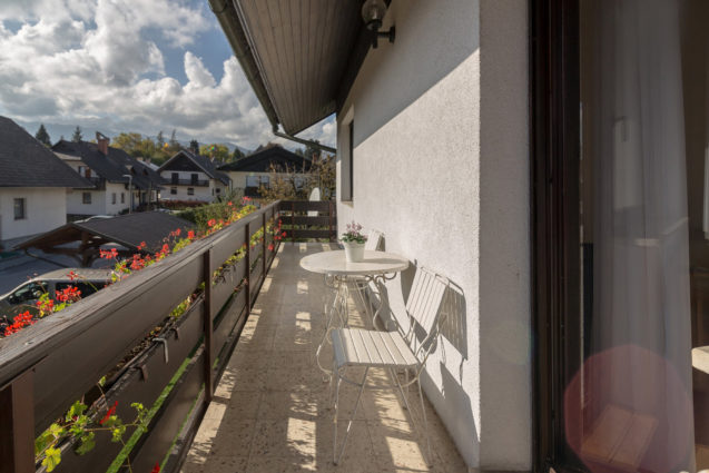 A balcony with street view at Apartments Fine Stay Bled in Slovenia
