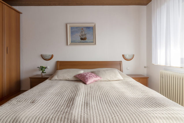 A large and very comfortable king-size bed at Apartments Fine Stay Bled in Slovenia
