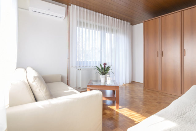 A very comfortable three-seater-sofa at Apartments Fine Stay Bled in Slovenia