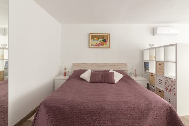 Double bed in the first bedroom of the Modern Apartment With Balcony and Terrace