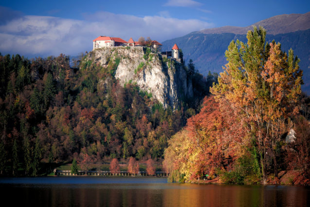 A hilltop Bled Castle above Lake Bled in the autumn