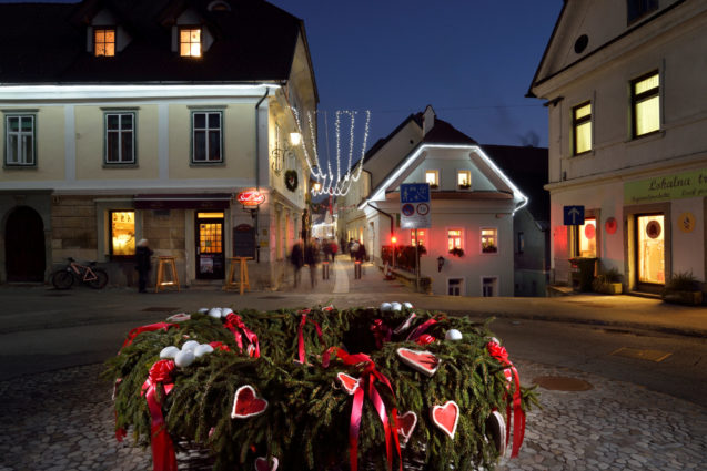 Christmas lights and an advent-wreath in the old town of Radovljica, Slovenia at night