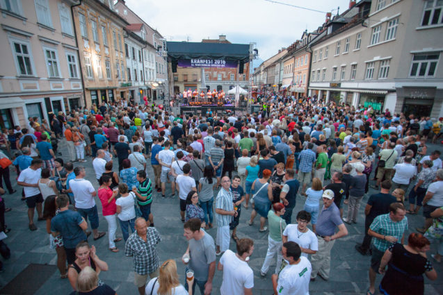 A group of locals and tourists in Main Square in the centre of Kranj during the Kranfest