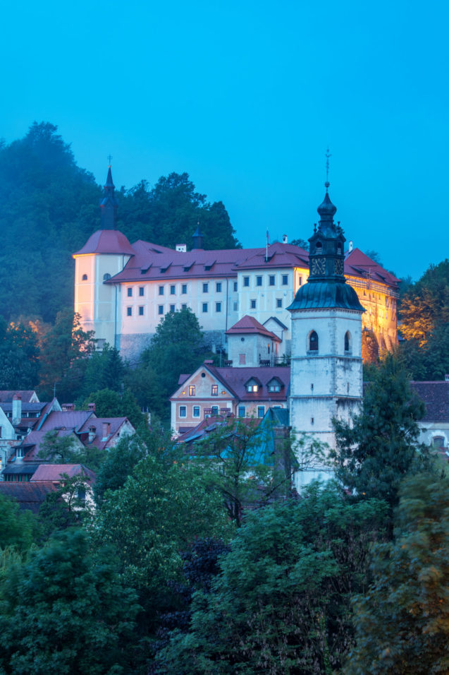 Loka Castle in the town of Skofja Loka in Slovenia in the evening