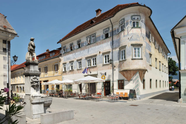 Vidic House and al fresco outdoor cafe in Radovljica Medieval Old Town in the summer