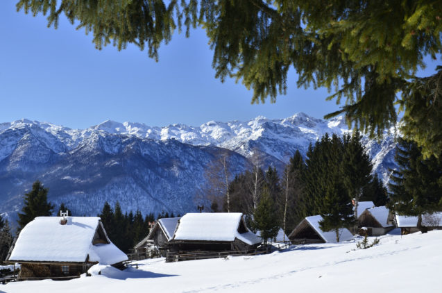 View of Slovenian Alps from Zajamniki mountain pasture in winter