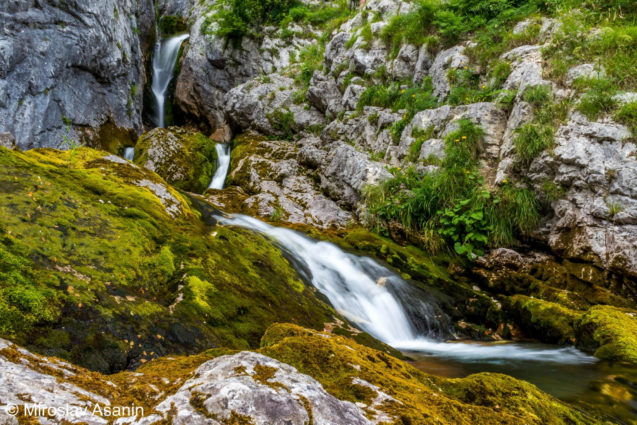 Soca River at its beginnings in Trenta Valley in Slovenia