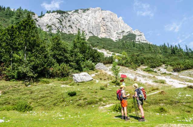 A group of hikers at Vrsic Mountain Pass in the Slovenian Alps