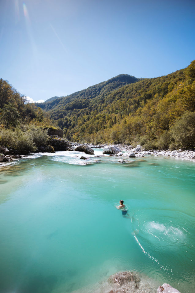 Swimming in Soca River in Soca Valley in northwestern Slovenia