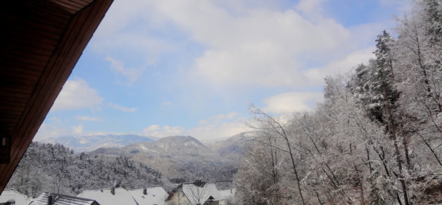 Panoramic view from the second balcony of Superior Apartment at Fine Stay Apartments after early spring snow storm