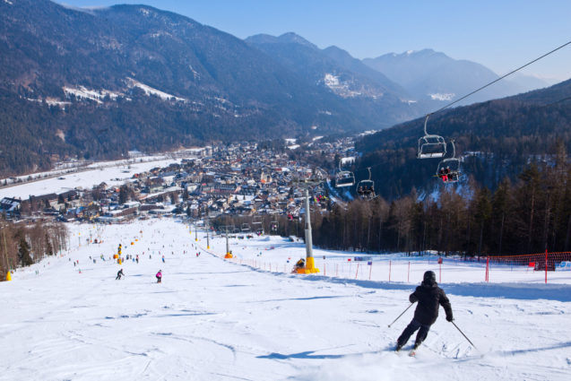 Skiers at Kranjska Gora Ski Resort in Slovenia