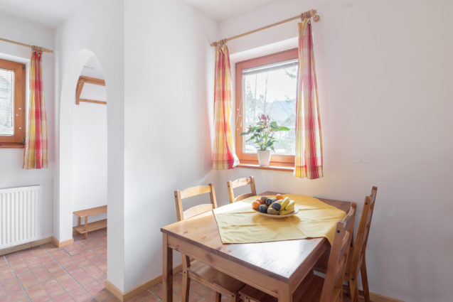 Dining table with 4 chairs in Duplex Apartment with Balcony at Apartments Valant Bled in Slovenia