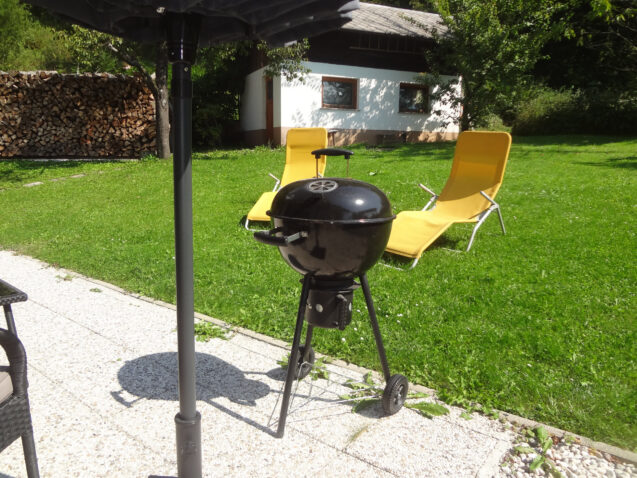 A new BBQ Charcoal Grill in the garden at Apartments Fine Stay