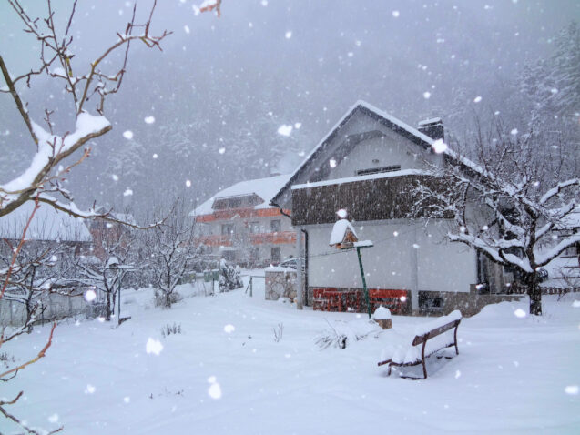 Exterior of Apartments Fine Stay in Slovenia in winter during snowfall