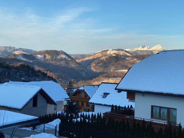 View of Slovenian Alps with Mount Triglav from the balcony at Apartments Fine Stay in winter