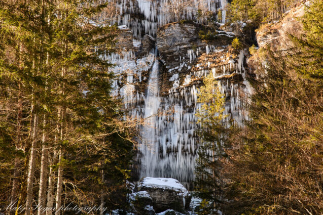 View of the Pericnik Waterfall from afar in winter